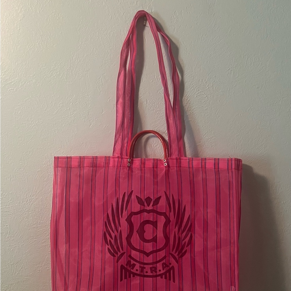 Jumbo Consuela mesh tote pink with stripe detail has handles and shoulder straps